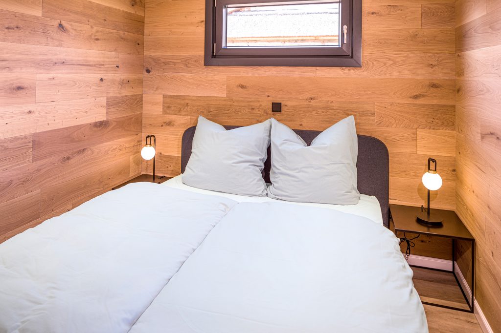 unicube - B2B Tiny House Schlafzimmer mit Bett